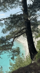 Woman films selfies at scenic clifftop in Dzhankhot, Russia