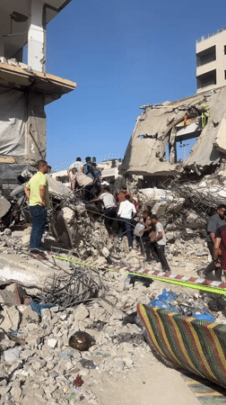 Rescue efforts underway at Gaza building collapse site