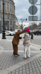 Street interaction captured between three people in Saint Petersburg