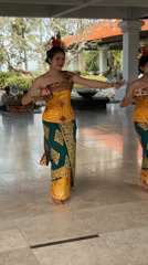 Traditional Balinese dance and music performed amid tranquil gardens