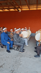 Traditional Islamic gathering with frame drums in Mayrtup, Chechnya