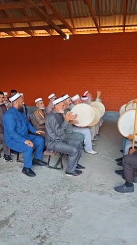Traditional Islamic gathering with frame drums in Mayrtup, Chechnya