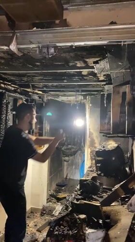 Fire damage survey inside a charred building in Bratsigovo