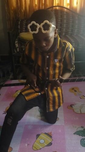 Man and child photographed in casual moment in Narayi