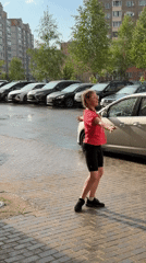 Hailstorm hits residential area with Soviet-era buildings, girl plays outside