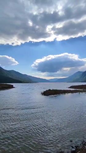 Lake view with mountains and sunlight in Kordon Baigazan