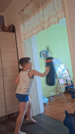 Kid's playful workout and goofing around at home in Moldova