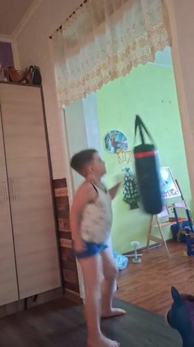Kid's playful workout and goofing around at home in Moldova