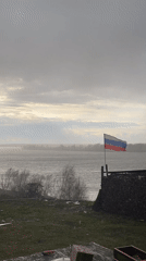 Overcast day captured overlooking water in Olkhovka, Russia