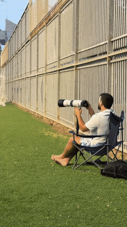 Amateur photographer films soccer match in Tel Aviv