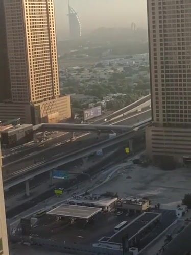 Aerial view of Dubai's road network captured from skyscraper
