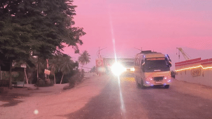 Evening travel documented across Indonesian roads and bridges