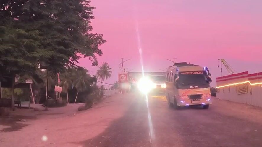 Evening travel documented across Indonesian roads and bridges