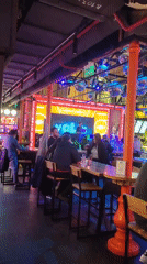 Evening social gathering features dining, dancing, live music