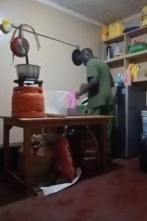 Two men cook, clean, fold laundry in Turbo home