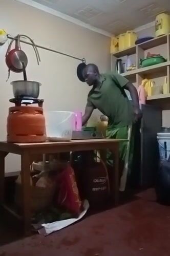 Two men cook, clean, fold laundry in Turbo home