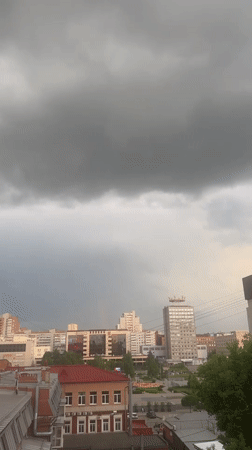 Brief rainbow spotted during rainy afternoon in Perm, Russia