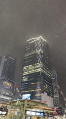 Snow or rain falls in Shibuya district, Tokyo