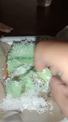 Traditional kue putu and coconut desserts in a Jepara courtyard