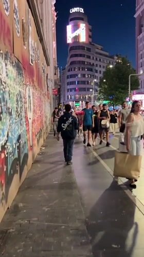 Madrid street life captured during evening hours