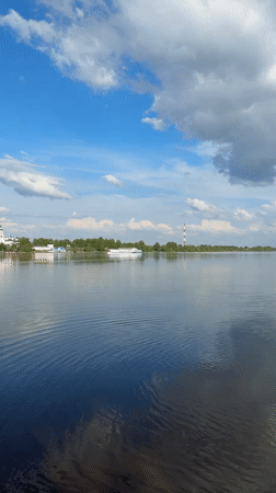 Family enjoys afternoon at Volga River beach in Yaroslavl