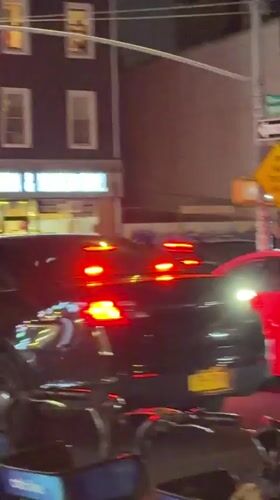 Night traffic stop with ambulance siren in Manhattan