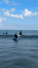 Early morning surf lessons documented at Kuta Beach Indonesia