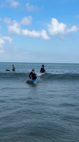 Early morning surf lessons documented at Kuta Beach Indonesia