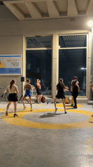 Six people dance poolside in Tel Aviv gathering
