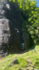 Rock climbers scale cliff face in Batumi, Georgia