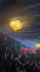 Formal dancing event held in decorated Sofia hall