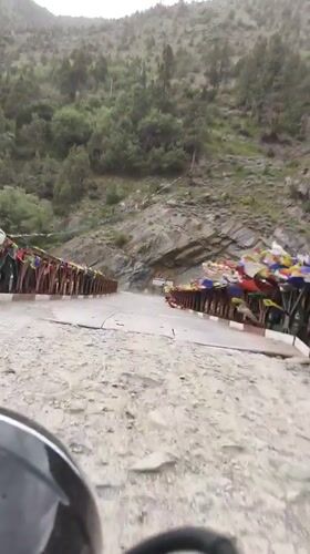 Mountain road journey through prayer flag country, Arat valley