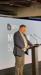 Speaker addresses Mintsyfra Summit audience in Kyiv conference venue