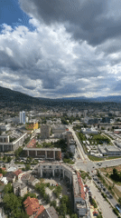 Tourist captures selfies at Sarajevo observation deck overlook
