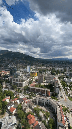 Tourist captures selfies at Sarajevo observation deck overlook