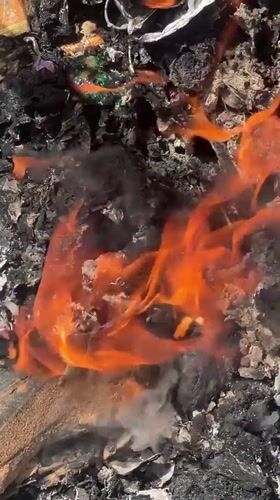 Trash fire burns in Gura Top, Nigeria
