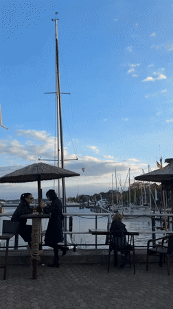 Visitor documents afternoon stroll through Kiel marina and harbor district