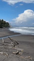 Black sand beach documented in Blahbatuh, Indonesia