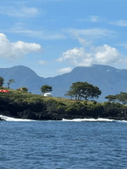 Boat passenger captures coastal scenery near Karangasem, Indonesia