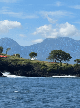 Boat passenger captures coastal scenery near Karangasem, Indonesia