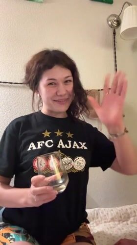 Casual evening indoors in Kudrovo, AFC Ajax shirt in frame