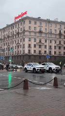 Rainy afternoon street life documented across Minsk, Belarus