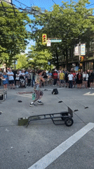 Street performer runs a full multi-act set on Granville Street