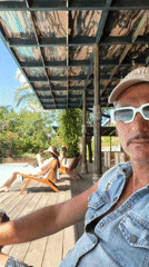 Quiet poolside gathering documented in Petulu, Indonesia