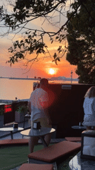 Couple enjoys sunset tea at Black Sea cafe in Sochi