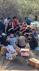 Truck overturns in remote Kyrgyzstan mountains, locals gather cargo