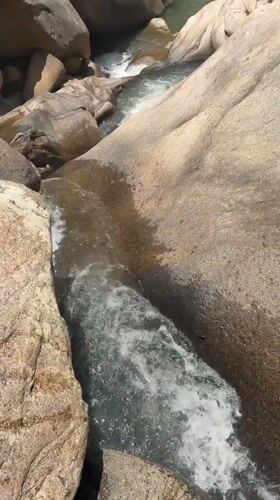 Visitors enjoy Ba Ho waterfalls recreation in Vietnam