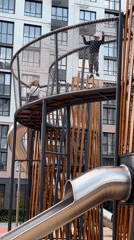 Children play at modern Tyumen playground complex Friday afternoon