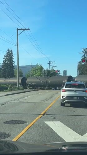 Early morning traffic encounters train crossing, truck in Coquitlam area