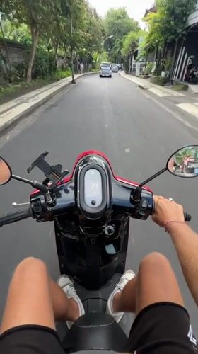 Late-night electric scooter ride recorded in Kuta, Indonesia